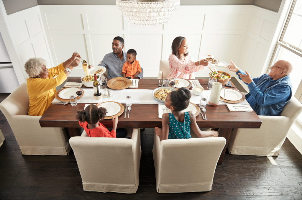 Family enjoying meal | Florida Floor Fashions