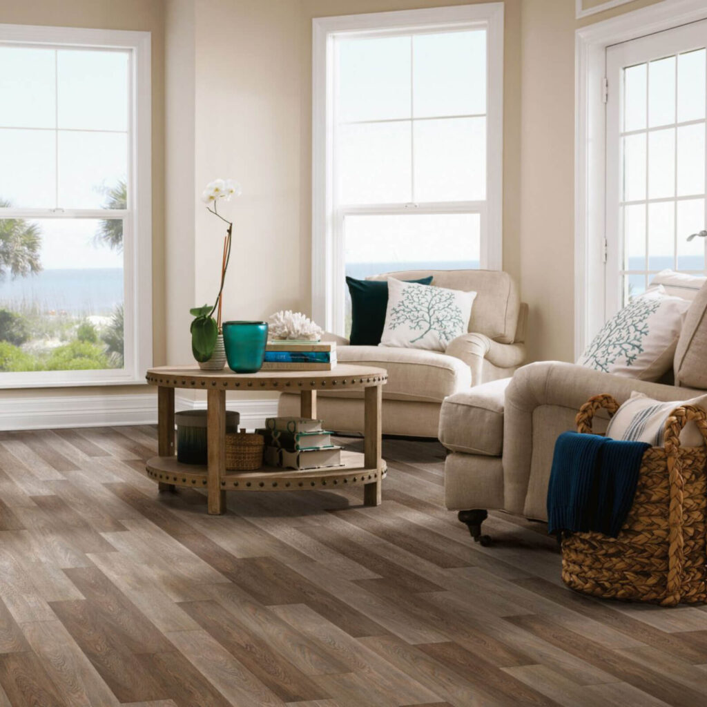 Living room with brown wood-look vinyl plank flooring