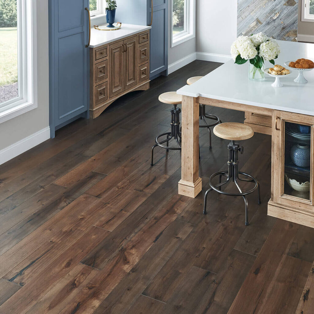 Dark hardwood floor in kitchen with island