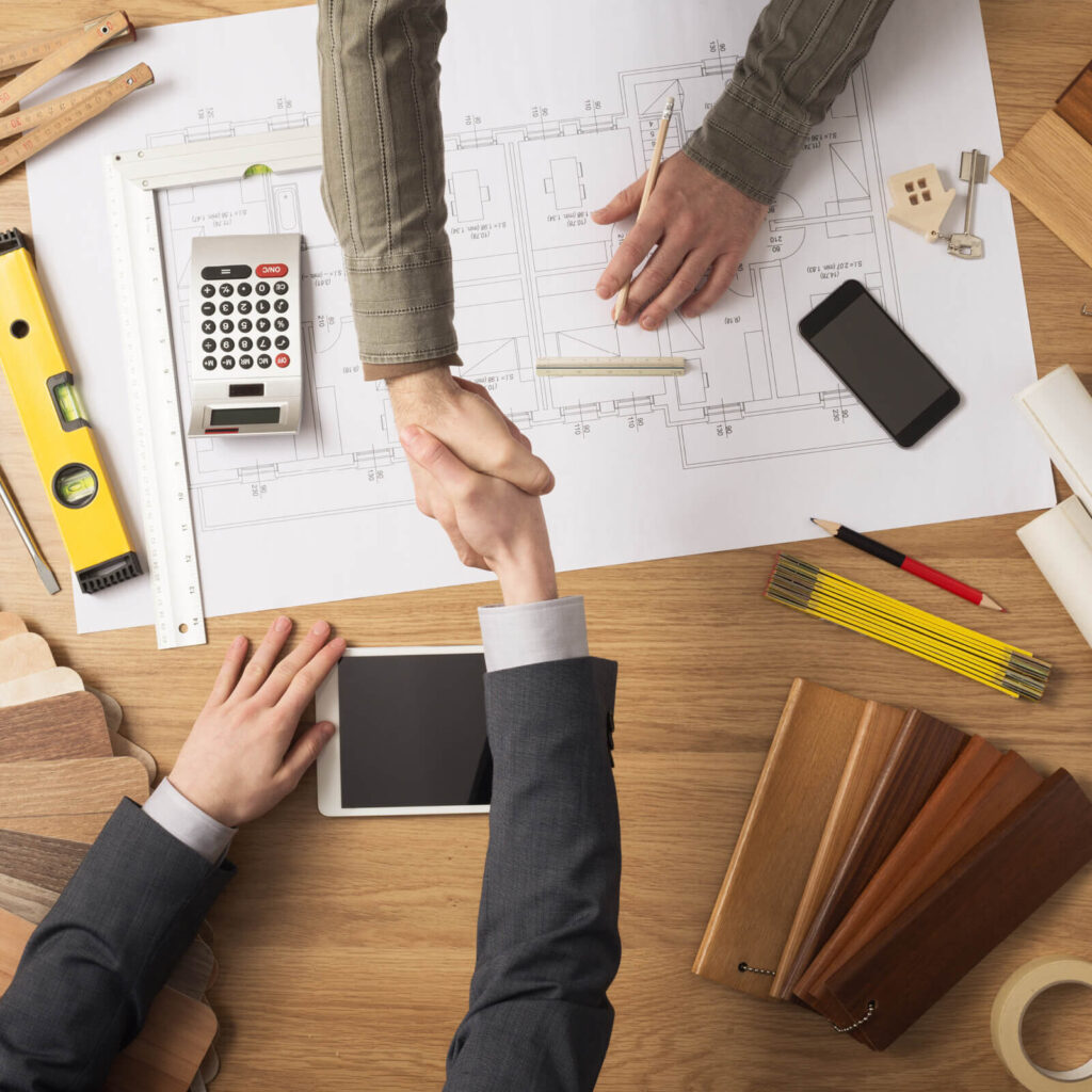 flooring estimator shaking customers hand